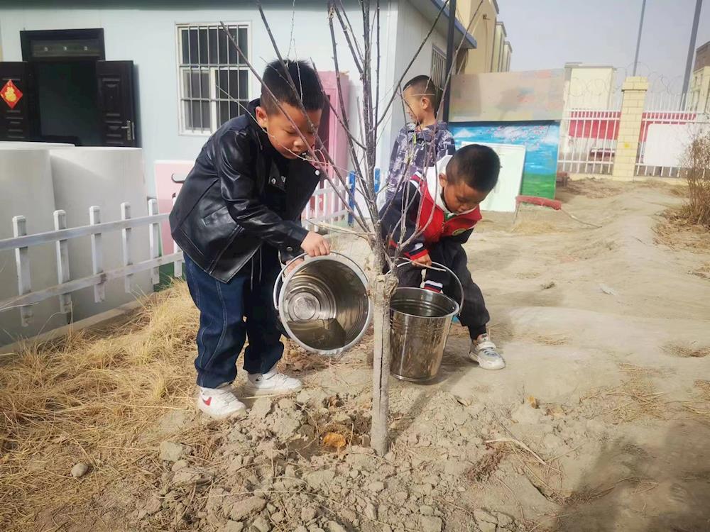 安居社区联合幼儿园开展植树节主题教育活动