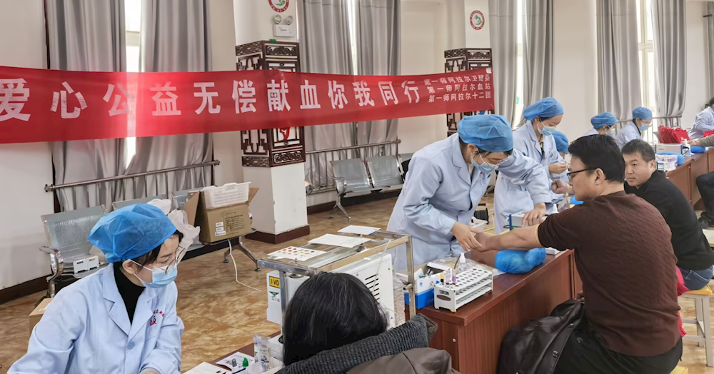 爱心汇聚塔河岸 热血奉献暖寒冬